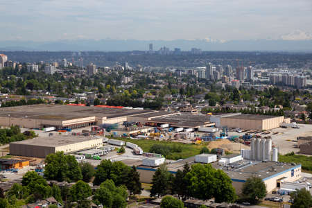 Burnaby, Greater Vancouver, BC, Canada - July 4, 2018: Aerial view of a modern city during a sunny summer day.のeditorial素材