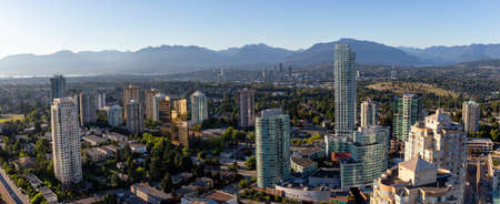 Burnaby, Vancouver, BC, Canada - July 12, 2018: Aerial view of a modern city during a vibrant sunny summer evening.のeditorial素材