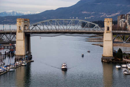 Downtown Vancouver, British Columbia, Canada - December 31, 2018: Aerial view on False Creek during a cloudy winter evening.のeditorial素材