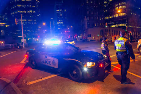 Downtown Vancouver, British Columbia, Canada - December 31, 2018: Vancouver Police are working in Jack Poole Plaza during New Years Eve.のeditorial素材