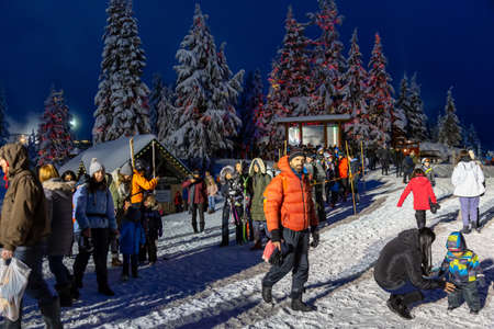 Vancouver, BC, Canada - December 27, 2018: Big crowd of people on top of Grouse Mountain during the Christmas Holidays.のeditorial素材