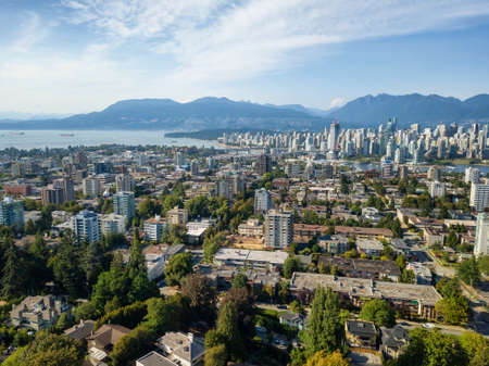 Aerial view of a modern city during a sunny summer day. Taken in Vancouver, BC, Canada.の写真素材
