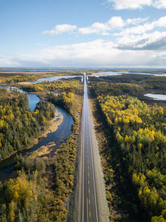 Aerial view of a scenic road during a beautiful sunny day in the Autumn. Taken near Grand...