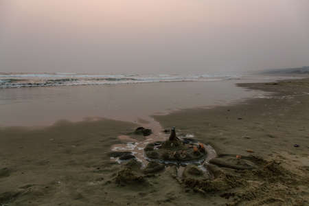 Beautiful sandy beach on the Pacific Ocean during a foggy sunset. Taken in Wickaninnish Beach, near Tofino and Ucluelet, Vancouver Island, BC, Canada.の写真素材