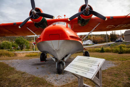St. Anthony, Newfoundland, Canada - October12, 2018: Memorial Water Bomber airplane during a cloudy day.のeditorial素材
