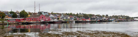 Lunenburg, Nova Scotia, Canada - October 7, 2018: Beautiful view of a historic port on the Atlantic Ocean Coast during a cloudy day.のeditorial素材