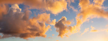Dramatic cloudscape during a dark and colorful sunset.