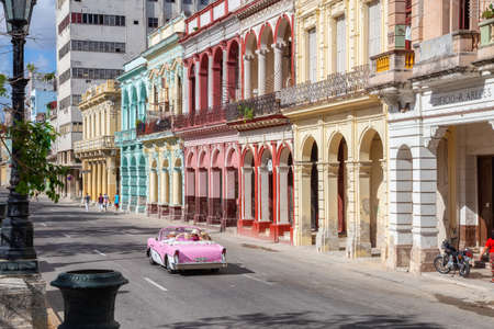Havana, Cuba - May 13, 2019: Classic Old Taxi Car in the streets of the Old Havana City during a...