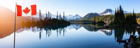 Garibaldi Lake during a colorful morning sunrise. Canadian National Flag Composite. Panoramic Mountain Landscape. Located near Whistler, Squamish and Vancouver, BC, Canada.の写真素材