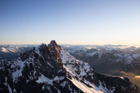 Aerial View of Remote Canadian Mountain Landscape during sunny sunrise. Located near Vancouver, British Columbia, Canada. Nature Background. Authenticの写真素材