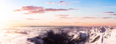 Aerial Panoramic View of Remote Canadian Mountain Landscape. Sunset or Sunrise Sky Composite. Located near Vancouver, British Columbia, Canada. Nature Panorama Background.の写真素材