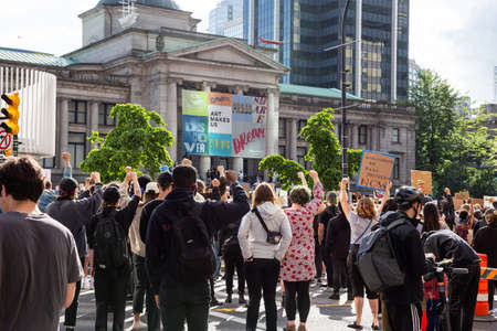 Downtown Vancouver, British Columbia, Canada - May 31, 2020: Big Crowd of People Protesting on Black...