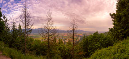 Beautiful Panoramic Landscape View of Fraser Valley from Abby Grind Hike during a colorful sunset....
