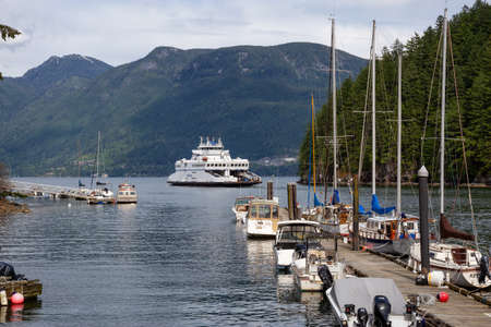 Bowen Island, British Columbia, Canada - June 5, 2020: Ferry leaving the terminal to Horseshoe Bay in West Vancouver.のeditorial素材
