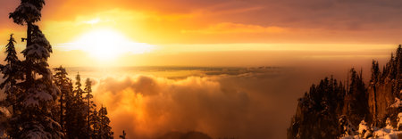 St Marks Summit, in Howe Sound, North of Vancouver, British Columbia, Canada. Panoramic Canadian Mountain Landscape View from the Peak. Dramatic Winter Sunset Sky Art Render.の写真素材