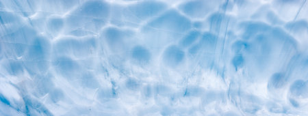 Beautiful Panoramic View of the Ice Cave in the Alpines on top of Blackcomb Mountain. Abstract...