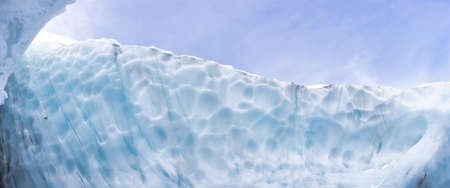 Beautiful Panoramic View of the Ice Cave in the Alpines on top of Blackcomb Mountain. Abstract...