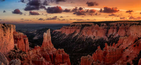 Aerial panoramic view of the beautiful American Canyon Landscape. Dramatic Colorful Sunset Sky Artistic Render. Taken in Bryce Canyon National Park, Utah, United Statesの写真素材