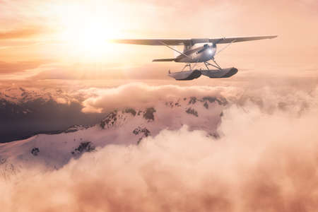 Airplane flying near the Beautiful Canadian Mountain Nature Landscape. Adventure Composite. Dramatic...