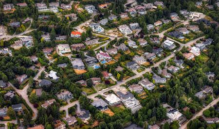 Aerial View of luxury homes in British Properties, West Vancouver, British Columbia, Canada. Taken during a sunny summer evening.の写真素材