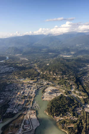 Aerial View from Airplane of a small touristic town, Squamish. Sunny Summer. Located in Howe Sound, North of Vancouver, British Columbia, Canada.の写真素材