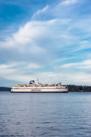 Victoria, Vancouver Island, British Columbia, Canada - August 9, 2021: BC Ferries Boat Arriving to...