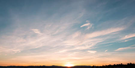 Panoramic View of colorful cloudscape during dramatic sunset. Taken on West Coast of Vancouver Island, British Columbia, Canada. Nature Background Panoramaの写真素材