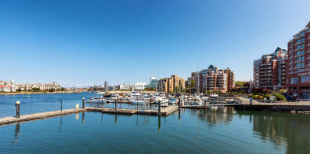 Victoria, Vancouver Island, British Columbia, Canada - August 17, 2021: Modern City Park in Downtown Victoria Harbour during sunny summer day.のeditorial素材