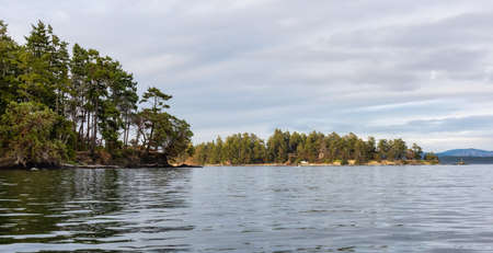 Gulf Islands on the West Coast of Pacific Ocean. Canadian Nature Landscape Background. Sunny Summer Evening. Near Victoria, Vancouver Island, BC, Canada.の写真素材