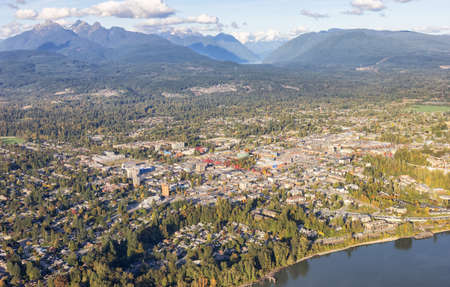 Maple Ridge City in Greater Vancouver, British Columbia, Canada. Aerial View from Airplane. Sunny...