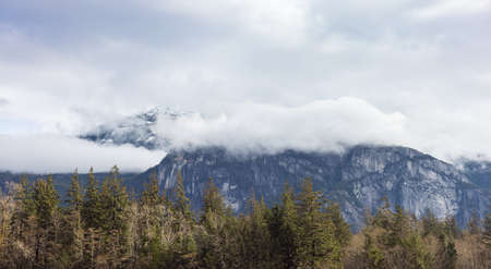 Scenic view of Chief Mountain during a cloudy spring day. Located in Squamish, North of Vancouver,...