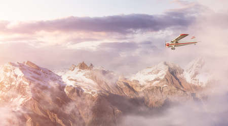 Single Engine Airplane Flying over the Rocky Mountain Landscape. Adventure Composite. 3D Rendering Plane. Aerial Background from British Columbia near Vancouver, Canada.の写真素材