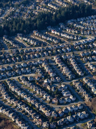 Aerial View of Residential Homes in a neighborhood of suburban modern city. Coquitlam, Vancouver, British Columbia, Canada.の写真素材