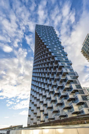 Downtown Vancouver, British Columbia, Canada - Jan 20, 2022: Unique Architectural Design at High Rise Residential Building in Urban City during sunny day.のeditorial素材