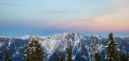 Sunset Twilight Panoramic View from top of Hollyburn Mountain in Winter Season. West Vancouver,...