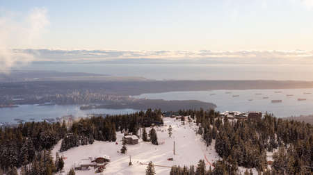 View of Top of Grouse Mountain Ski Resort with the City in the background. North Vancouver, British...