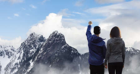 Adventure Composite of Man and Woman Couple. Aerial Background Image from British Columbia, Canada...
