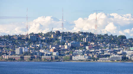 Downtown Seattle, Washington, United States of America. View of the Modern City on the Pacific Ocean Coast. Cloudy Blue Sky.の写真素材