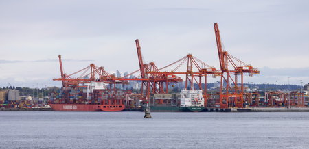 Downtown Vancouver, British Columbia, Canada - May 7, 2022: Panoramic View of Port in a modern city during cloudy day.のeditorial素材