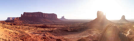Desert Rocky Mountain American Landscape. Sunny Morning Sunrise. Oljato-Monument Valley, Utah, United States. Nature Background Panorama.の写真素材