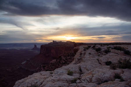 Scenic American Landscape and Red Rock Mountains in Desert Canyon. Spring Season. Sunset Sky. Canyonlands National Park. Utah, United States. Nature Background.の写真素材