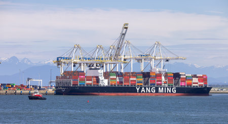 Tsawwassen, Greater Vancouver, British Columbia, Canada - July 14, 2022: Tanker Ship with containers at a port.のeditorial素材