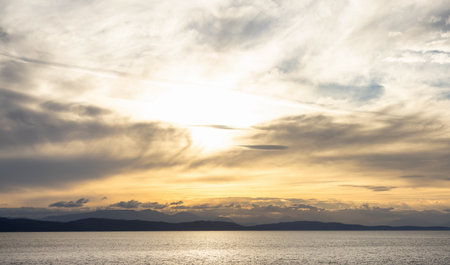 Cloudy Cloudscape during sunny summer Day on the West Coast of Pacific Ocean. British Columbia, Canada. Sunset Skyの写真素材