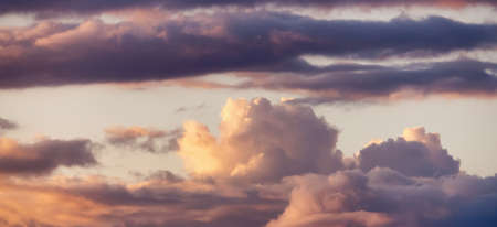 Puff Clouds in the Sky during sunset. Zoom in. Cloudscape Background. British Columbia, Canada.