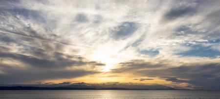 Cloudy Cloudscape during sunny summer Day on the West Coast of Pacific Ocean. British Columbia, Canada. Sunset Skyの写真素材