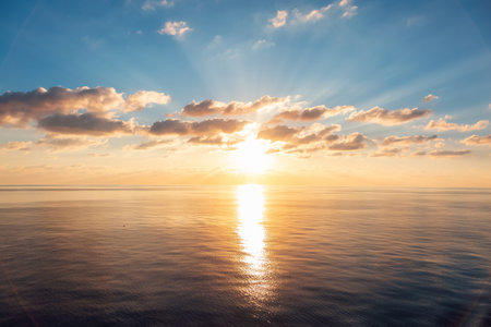 Dramatic Colorful Sunrise Sky over Mediterranean Sea. Sky wint Sunrays. Cloudscape Nature Background.の写真素材