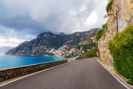 Scenic Road on Rocky Cliffs and Mountain Landscape by the Tyrrhenian Sea. Amalfi Coast, Positano, Italy. Adventure Travelの写真素材