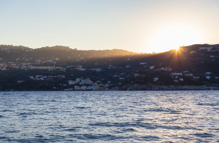 Capri Island in Bay of Naples, Italy. Sunny Sunrise Sky. Nature Background.