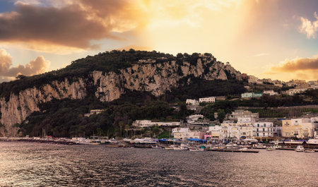 Capri Island in Bay of Naples, Italy. Sunrise Sky Art Render. Town and Marina.の写真素材