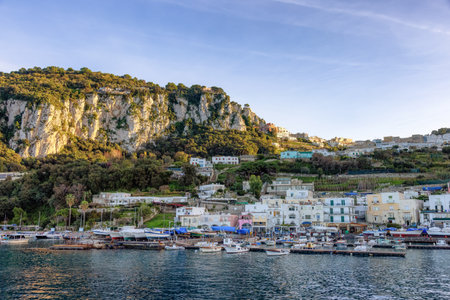 Capri Island in Bay of Naples, Italy. Sunny Evening. Town and Marina.の写真素材